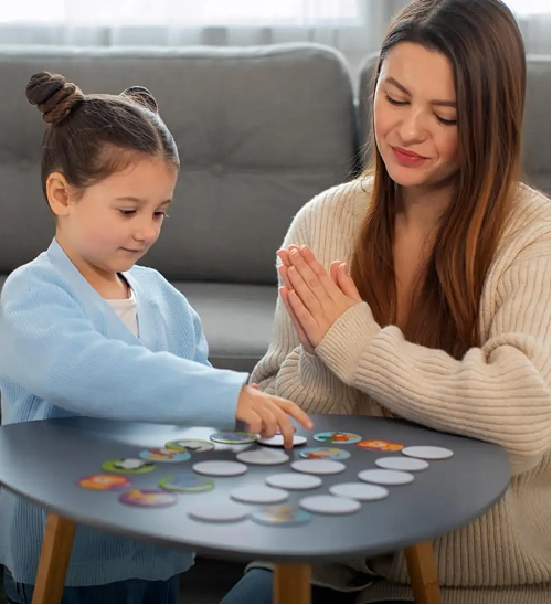 Mother playing with her daughter