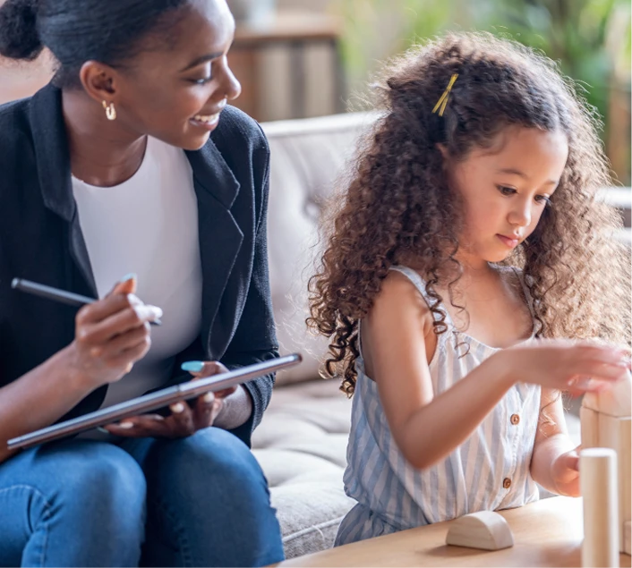 Woman playing with a girl