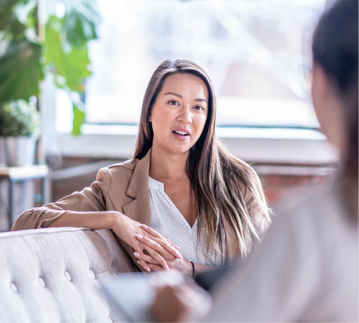 Psychologist conducting a session with a woman