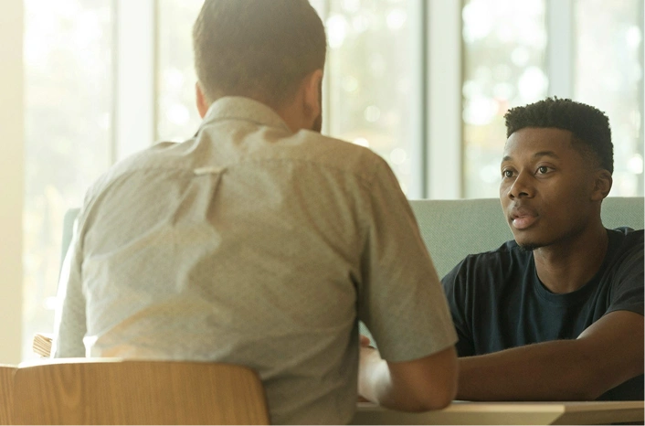 Two people having a conversation