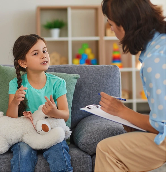Psychologist conducting a session with a girl