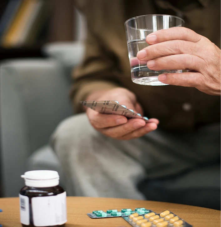 Person taking pills