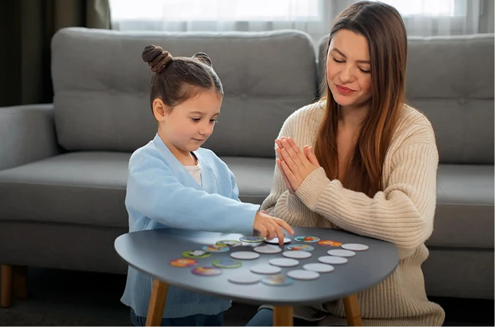 Mother playing with her daughter
